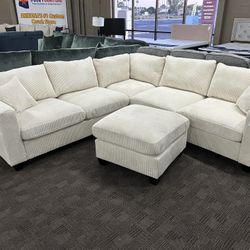 Light Beige Sectional And Ottoman 