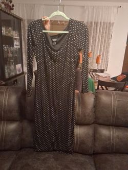 Black long sleeve bodycon dress with silver rhinestone polka dots. Size M.