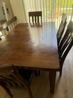 Dining table with 4 chairs and bench
