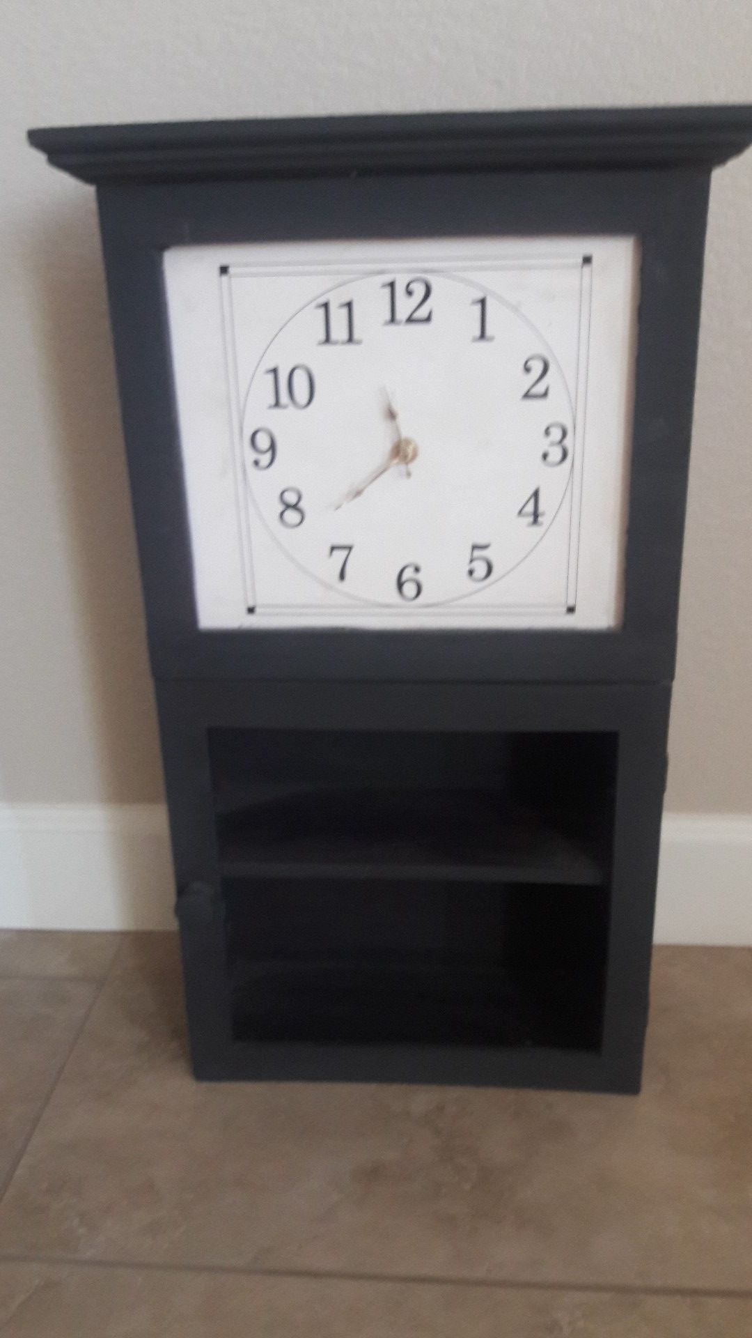 Wall clock with shelves