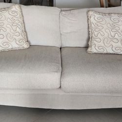 1 Sofa.  And Set Of 3 Tables