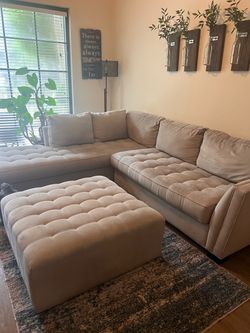 Light Gray Tufted Sectional Sofa with Ottoman
