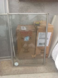 2 glass Windows 22 and a half by 34 and a half