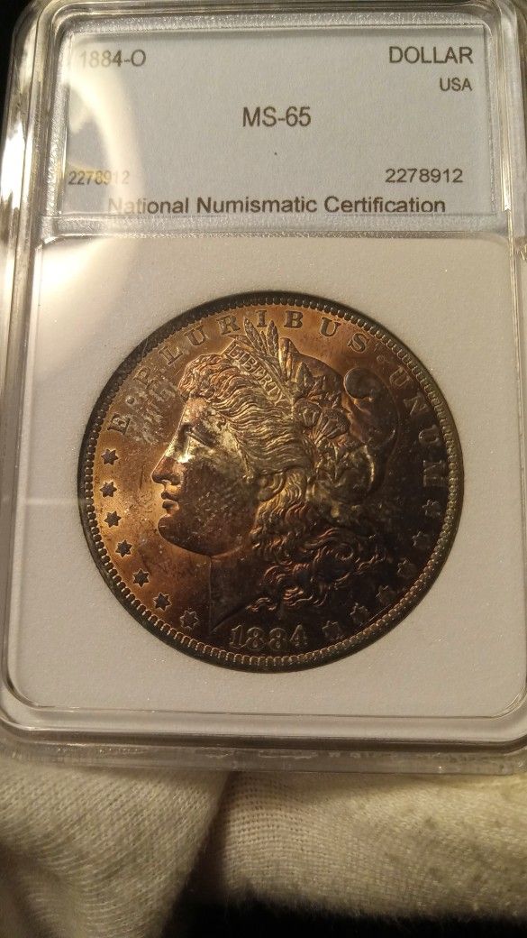 1884-O Morgan Silver Dollar NNC MS 65 New Orleans MintToned On Obverse