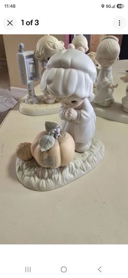 Precious Moments Porcelain Figurine with Pumpkin