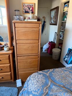 Genuine Oak, four drawer filing cabinet perfect condition