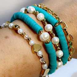 beautiful set of 5 gold plated bracelets