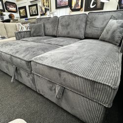 New Dark Gray Reversible Sectional W/ Cup Holder