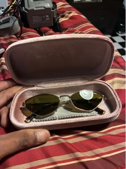 Miu Miu sun glasses