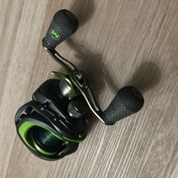 Lews Mach 2 Right Handed Bait Caster W/ Braided 15 Lbs Line 