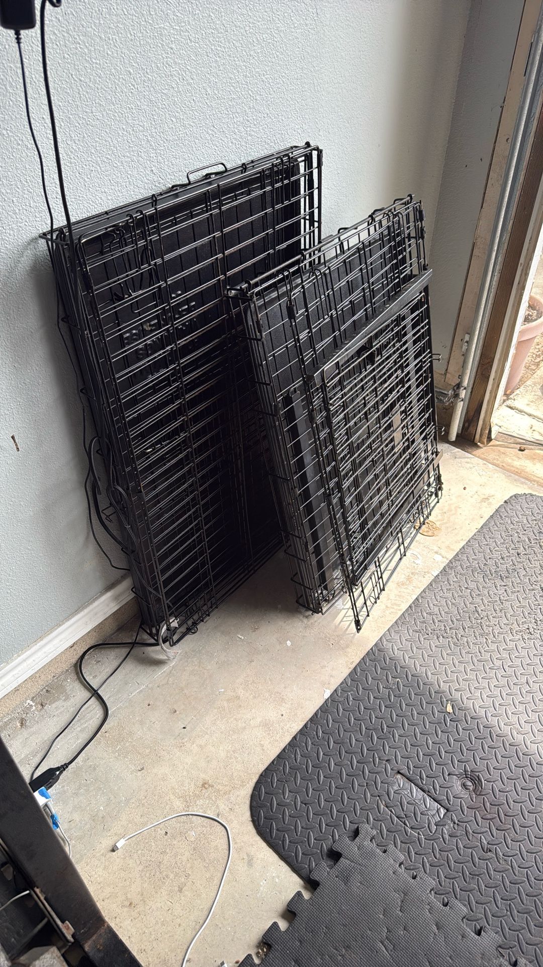 Two dog kennels