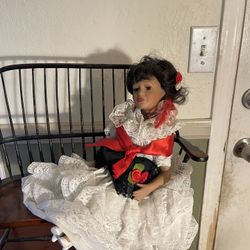 Porcelain Doll Sitting 