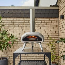 Ooni Karu 12 Multi-fuel Outdoor Portable Pizza Oven - Reaches 950°F and Cooks 12 Inch Pizzas in 60 Seconds. Versatile Wood or Propane Gas Fired Grill 