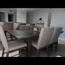 Dining room set with chairs and extra leaf 