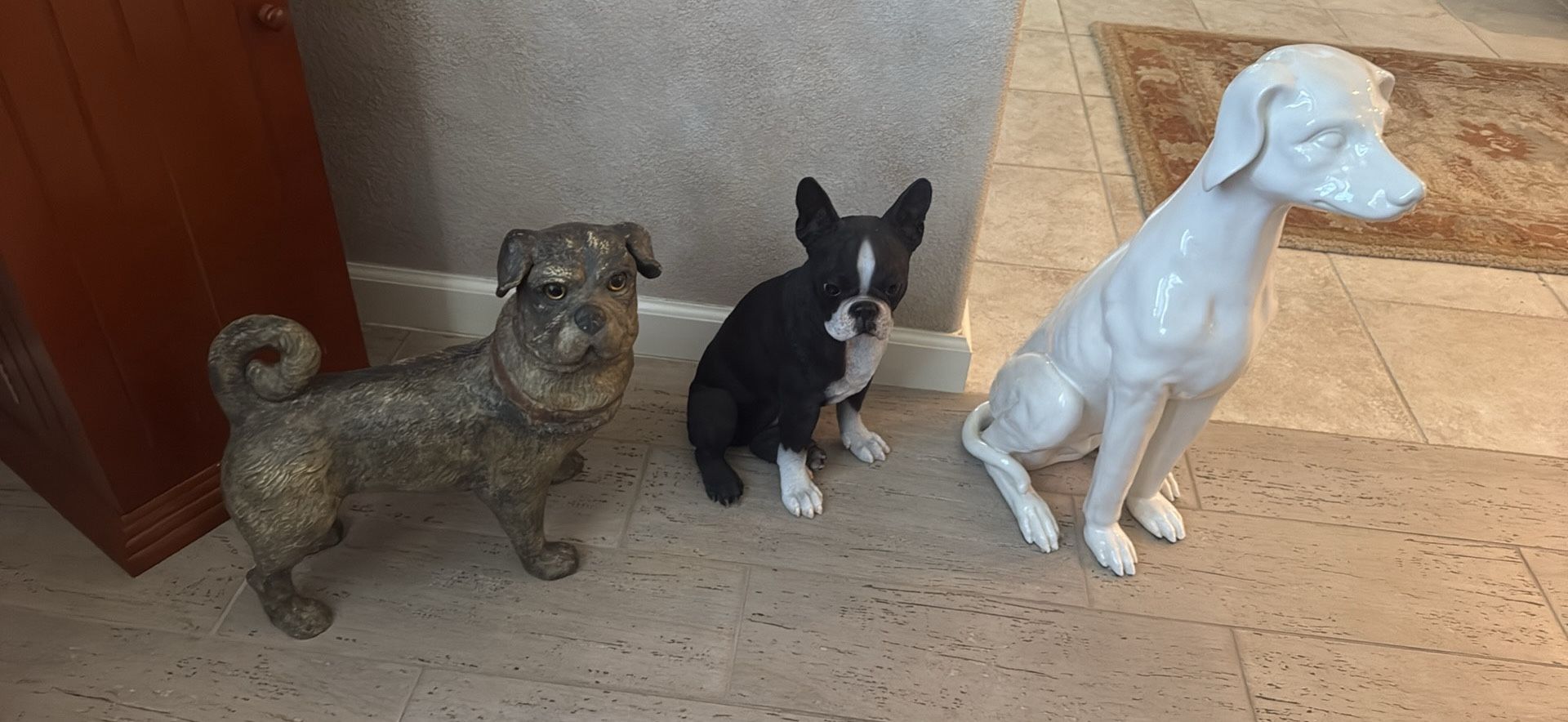 Three Dogs Statues