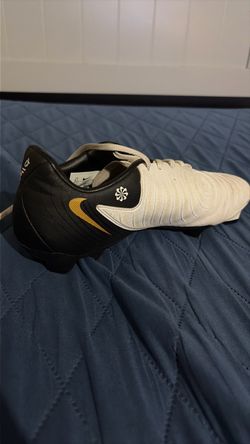 Phantom white, black and gold cleats