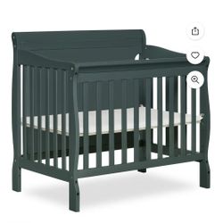 1330: Brand New Dream On Me Aden Full Panel Convertible, 4-in-1 Mini Crib In Olive, Greeguard Gold Certified, Grow with Me Bed, Crib. Toddler Bed, 