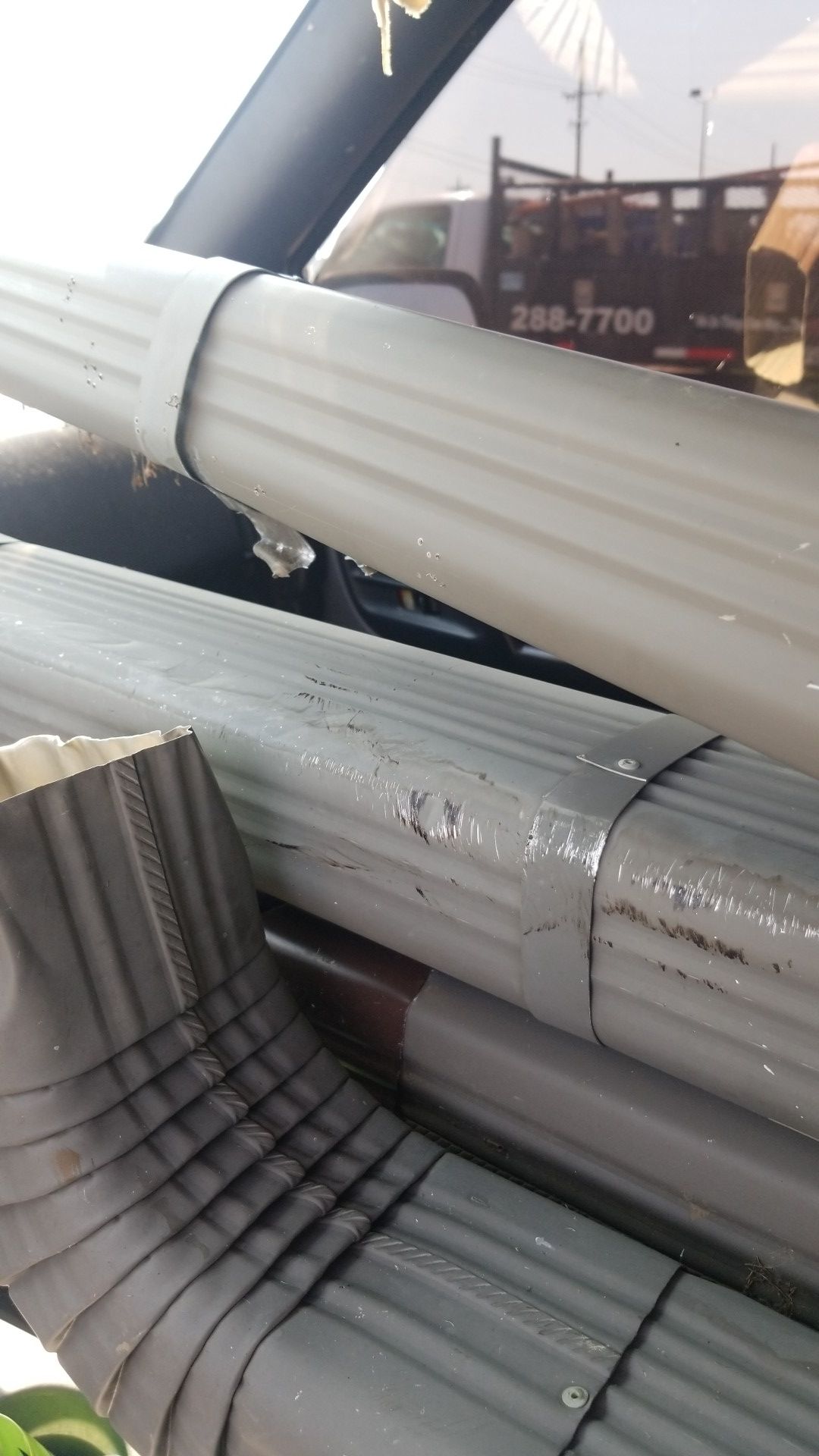 Salvaged. Used gutter 5" downspouts, elbows