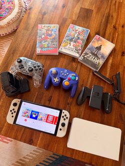 Nintendo Switch OLED White Bundle + 3 Games + 2 Extra Controllers