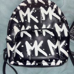 Like New Small Mk Backpack And Wristlet 