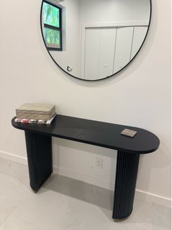 Black fluted wood console table or desk