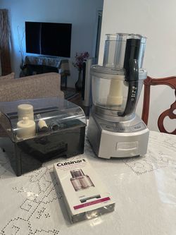 12 cup Cuisinart food processor with box of accessories plus you’ll gain another food processor for free when buying this item will be tested for you