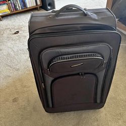 SET OF 2 -4  WHEELED SUITCASE  ONE CARRY ON SIZE -  28X18X9