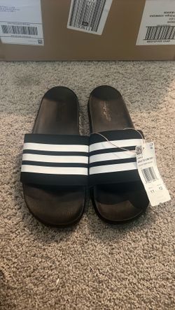 Adidas size Men’s 11/ women’s 12