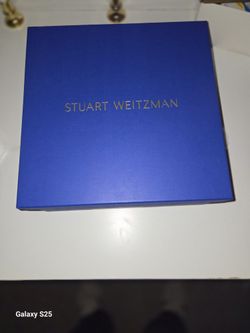 Empty blue Stuart Weitzman shoe box. 