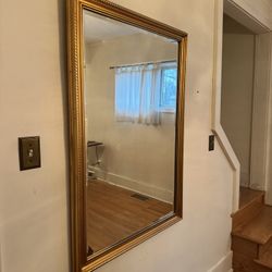 Large 46” x 31” gold braided framed Beveled mirror