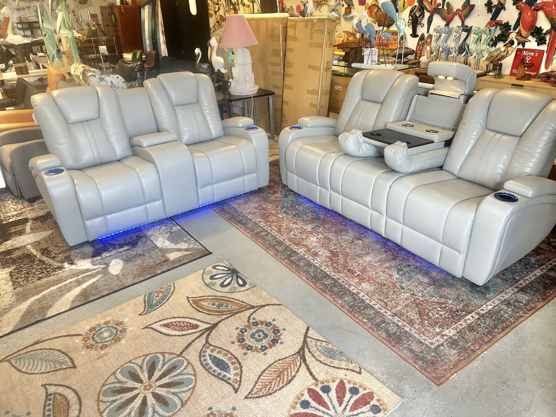 Like New 6 Months Old Leather Electric Dual Reclining Couch And Loveseat With Electric Headrests And Dual USB And Led Lighting And Wireless Charging