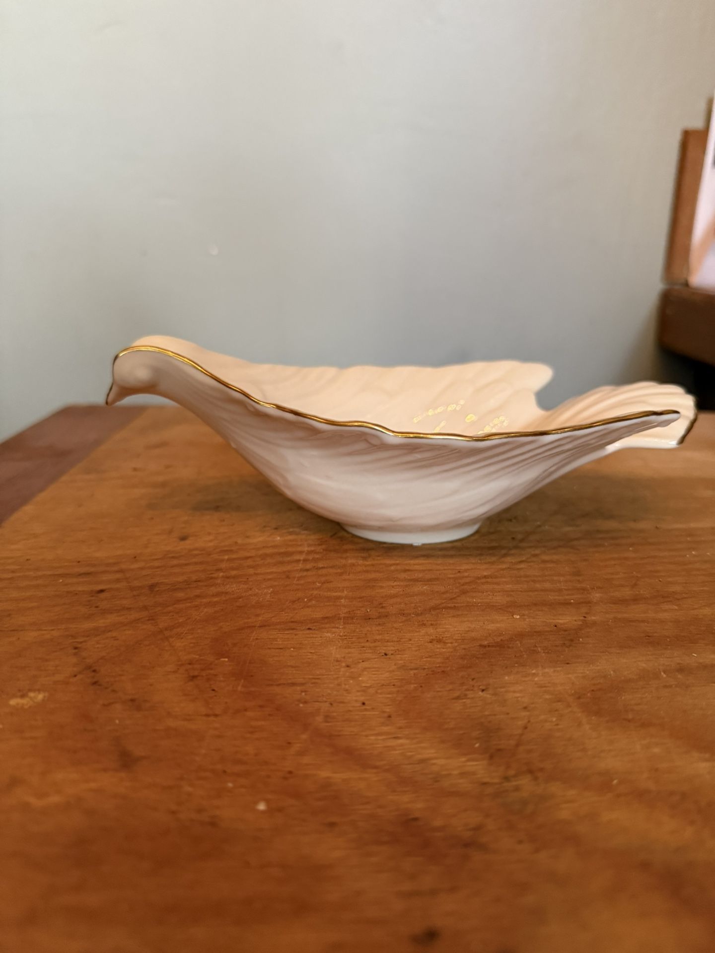 The Lenox Dove Candy Nut Dish is a retired vintage piece of fine China,