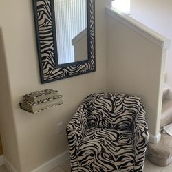 books sofa and mirror