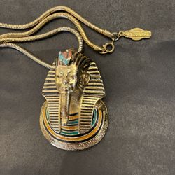 Eisenberg Signed King Tut. Egyptian Revival Pharaoh Pendant On 24” Heavy Chain. From the 1970s.   The Pendent Is 18k Electoplate and Is 2 1/2” X 1 3/4