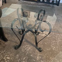 Vintage pair of wrought iron indoor outdoor glass top end tables. Great condition very sturdy.
