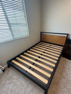 Full Size Bed with Wooden Headboard