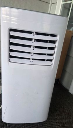 Portable home air conditioner, scratched outside, new inside