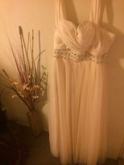 Beautiful ivory floor length dress ,can be used for a prom or wedding