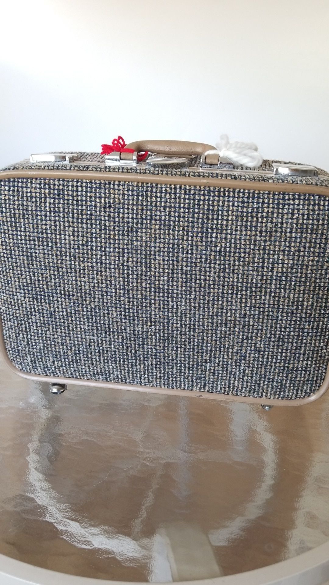 Fabric rolling, locking suitcase carry on