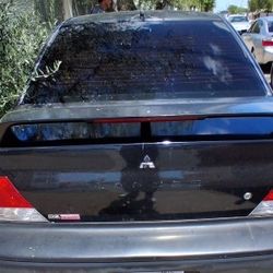 Mitsubishi Lencer Es  2002 Standar Color Negro Por Dentro Y Fuera