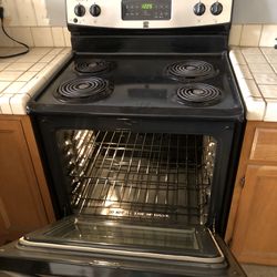 Great condition 3 year old Washer Dryer Refrigerator, Kenmore range and stove, full size bed original artwork you can have it all for $500 !! or buy i