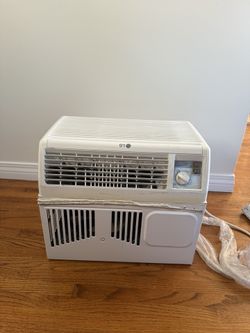 3 AC LG window air conditioner, likely a 5,000 BTU model