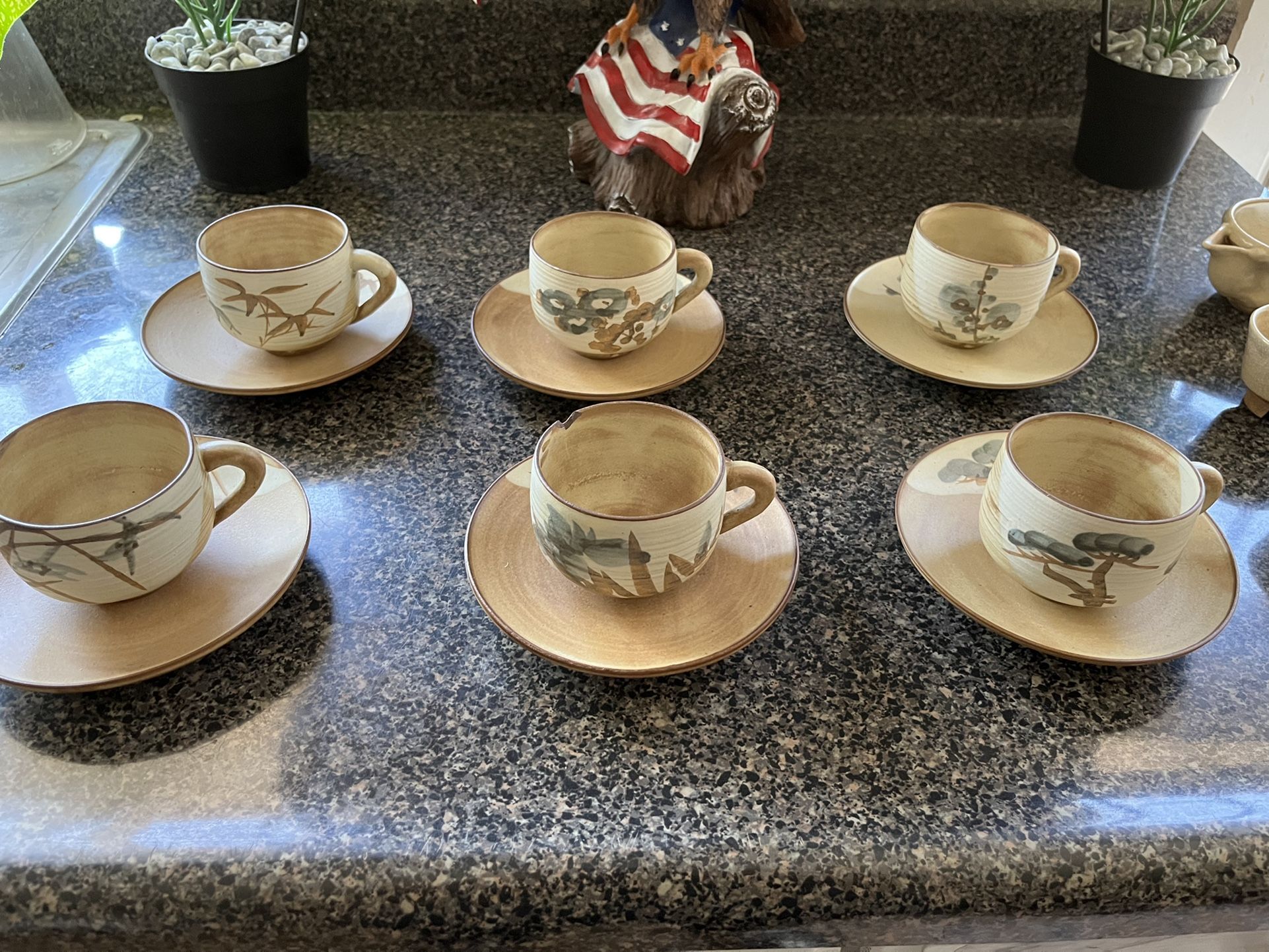 Antique T Cup Set.