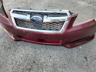 2013-2014 Subaru legacy front bumper with all the accessories OEM.