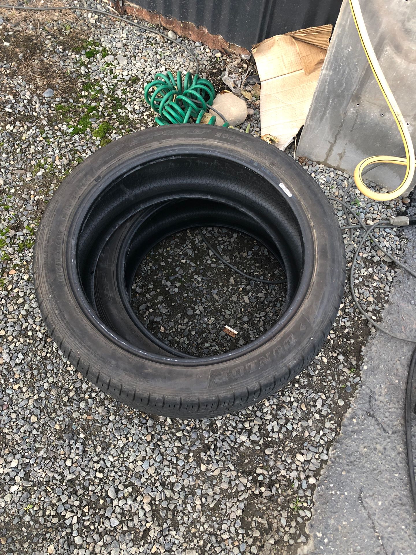 215/45/18 dunlop tires. 2. Look like 60% tread $60