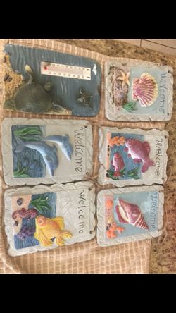 Hanging sea fish’s, dolphin,shells,turtle