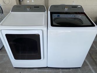 Free delivery. 2021 XL capacity, Samsung, washer and electric dryer.