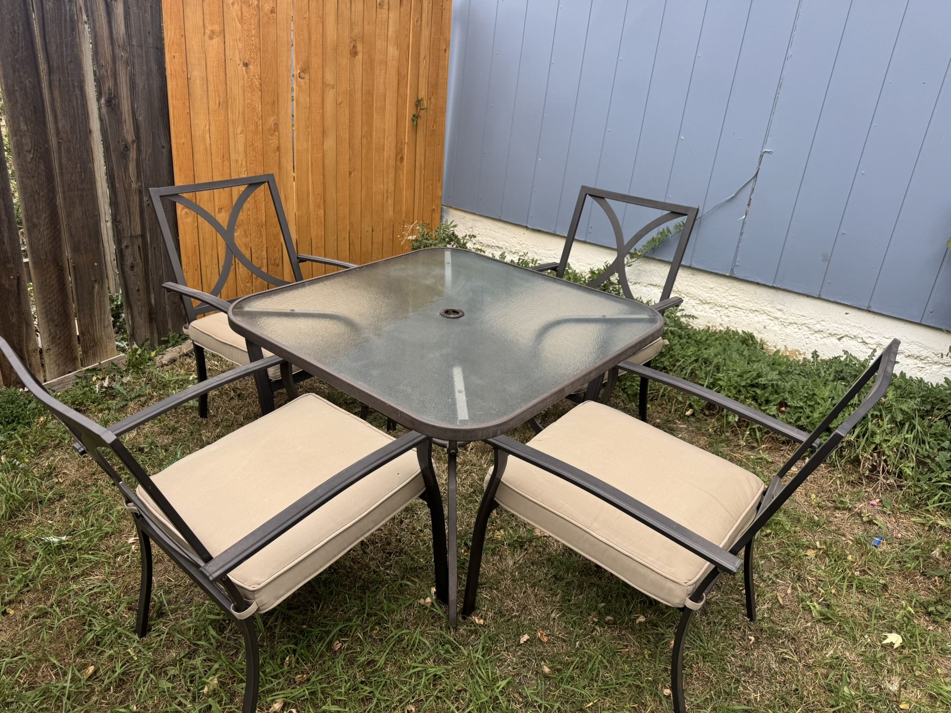Glass Patio Table and 4 Chairs
