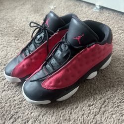 Pink and black Jordan 13’s