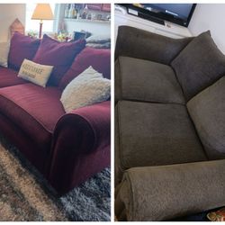 Beautiful clean living room set couch and love seat with matching throw pillows (not in photo) larger couch is red smaller love seat is gray both have